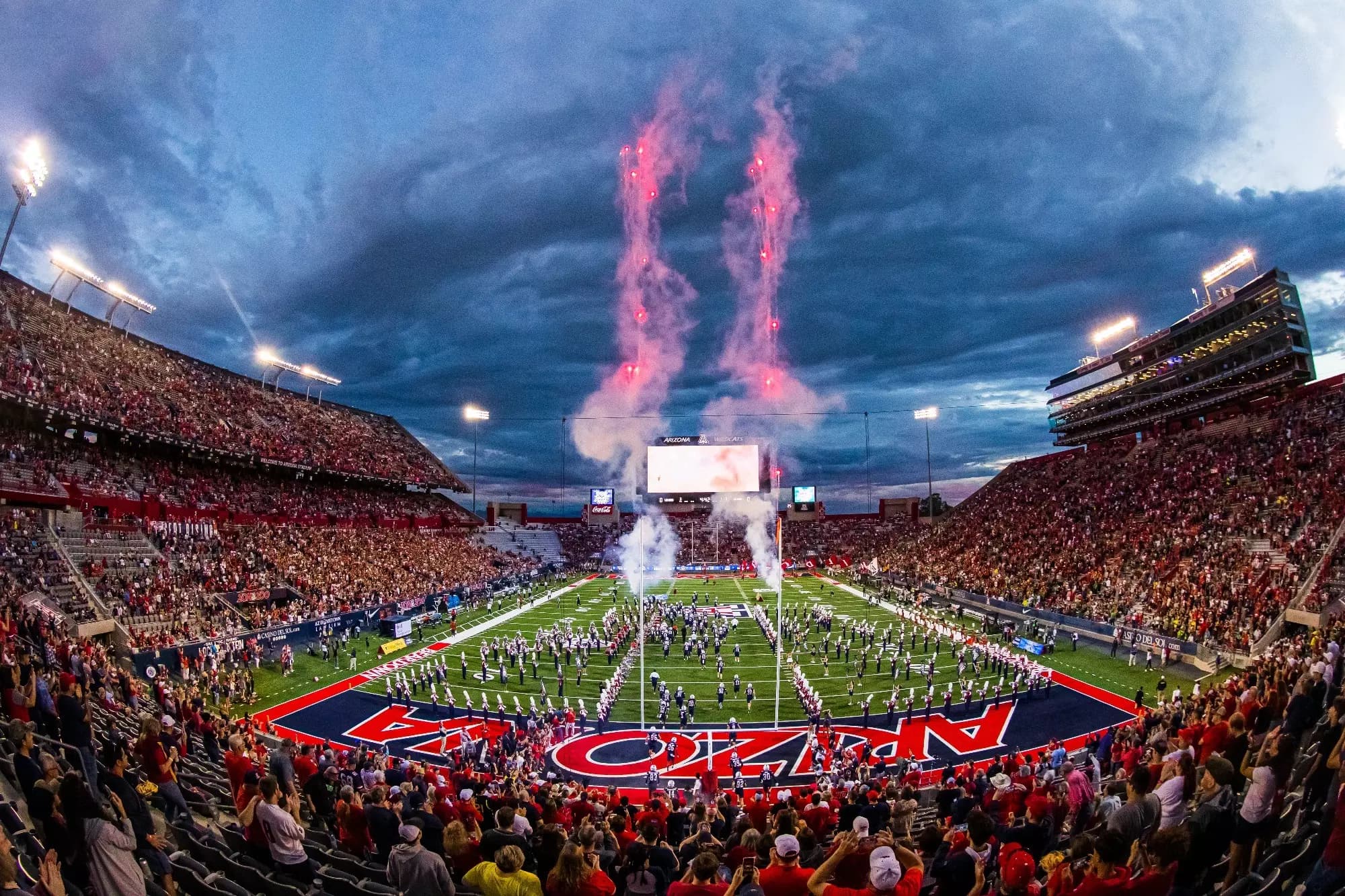 Casino Del Sol Stadium in Tucson on game day — the Arizona Wildcats' home since 1929, with the desert mountains beyond the stands